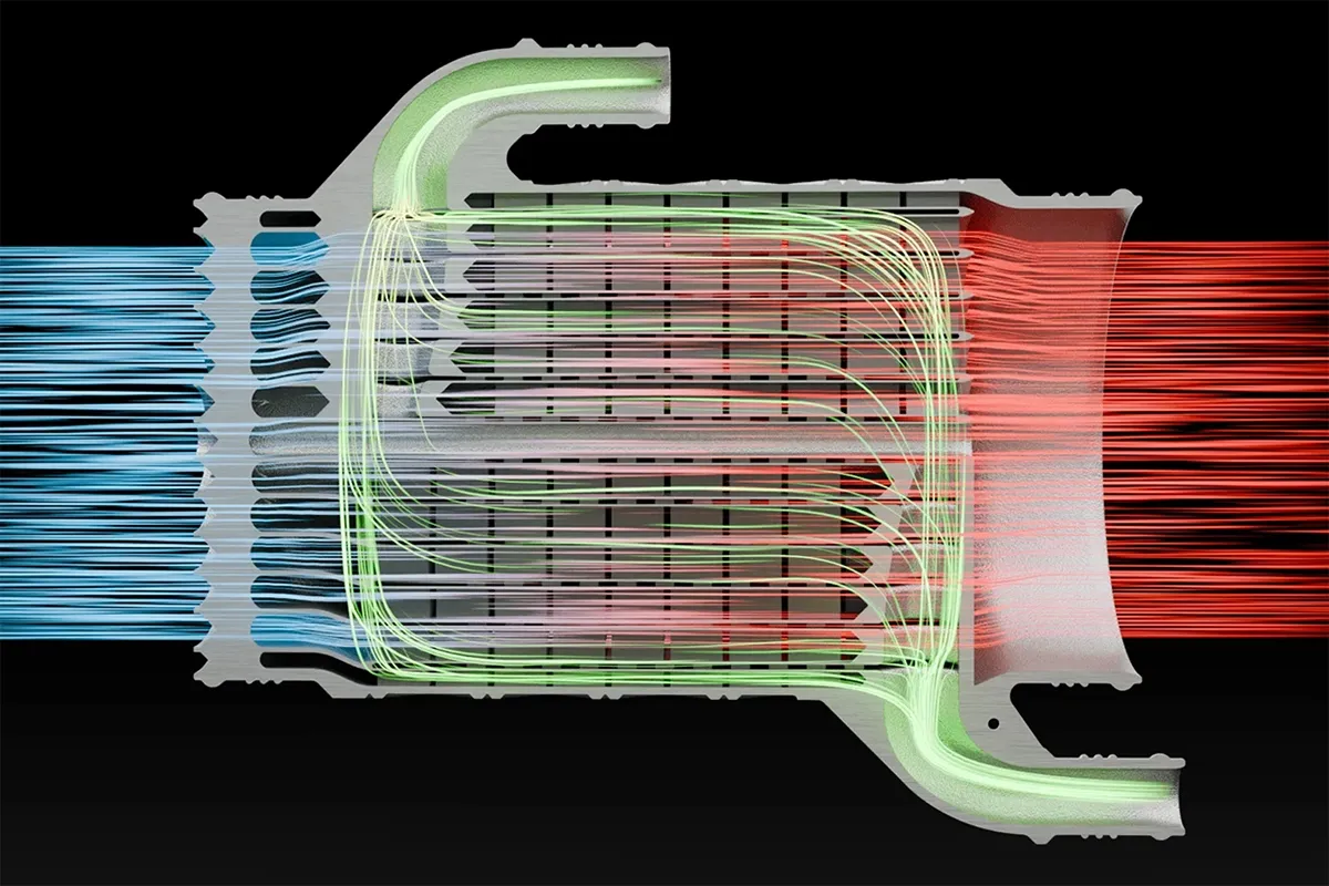 Cross-section of a Conflux additively manufactured intercooler core showing charge air and coolant flow paths through ultra thin printed fins