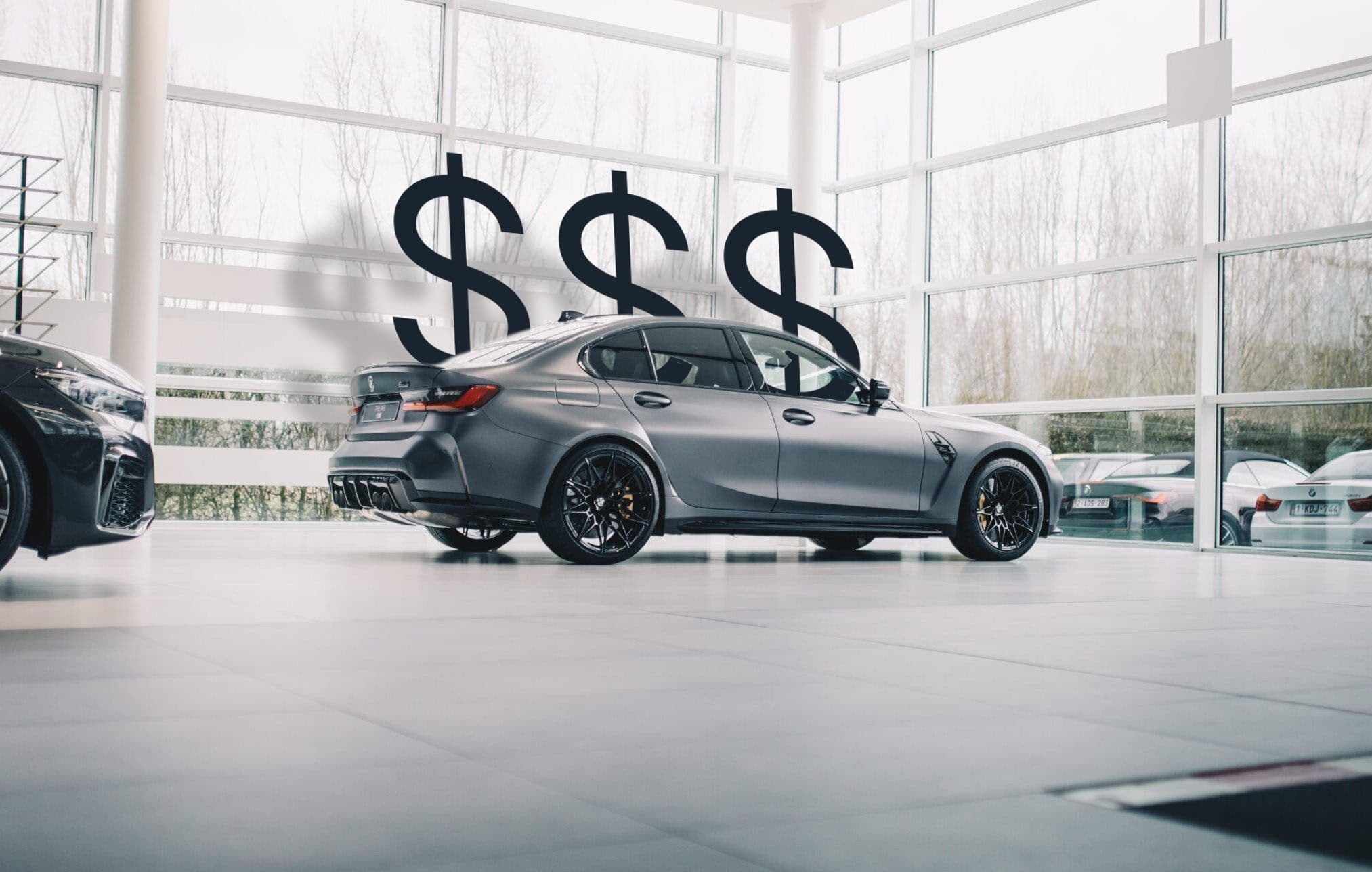 G80 BMW M3 in a dealership showroom with dollar signs illustrating high vehicle cost