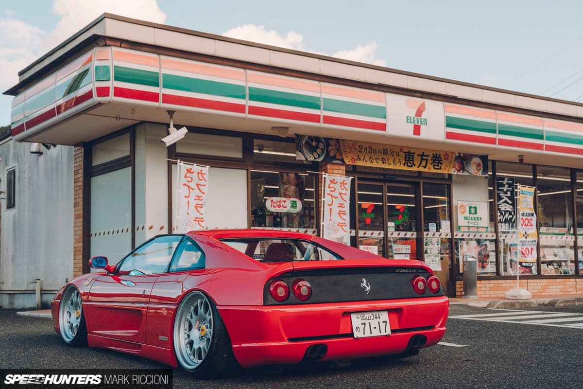 Ferrari F355 fitted with Air Lift Performance suspension parked outside a Japanese 7-Eleven