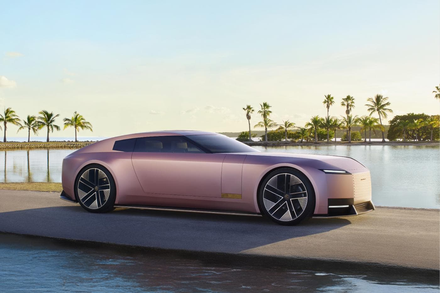 Side profile of the Jaguar Type 00 electric concept in Miami Pink, revealed at Miami Art Week 2024 as the centrepiece of Jaguar's Copy Nothing rebrand.