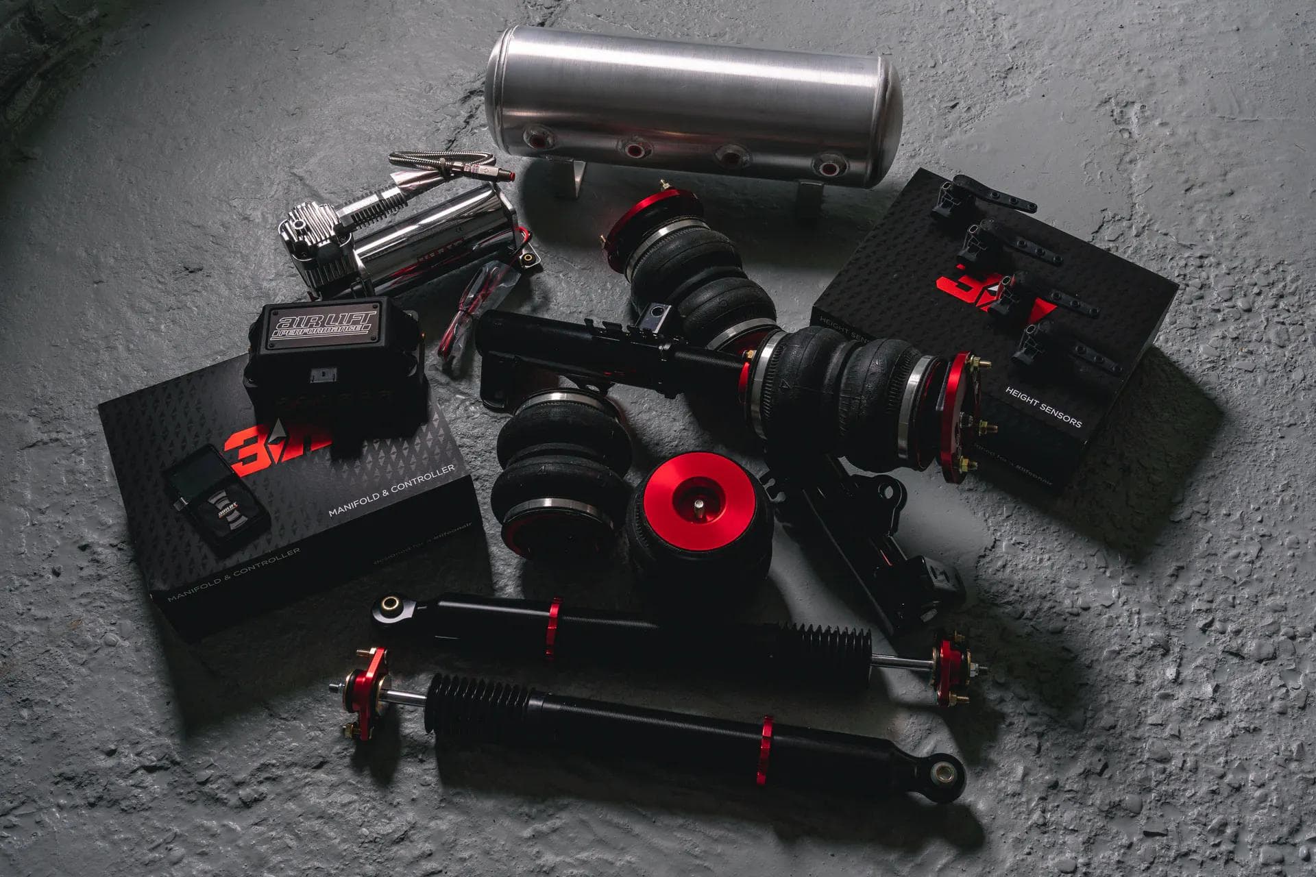 Full Air Lift Performance air suspension kit including air struts, tank, compressor, and controller