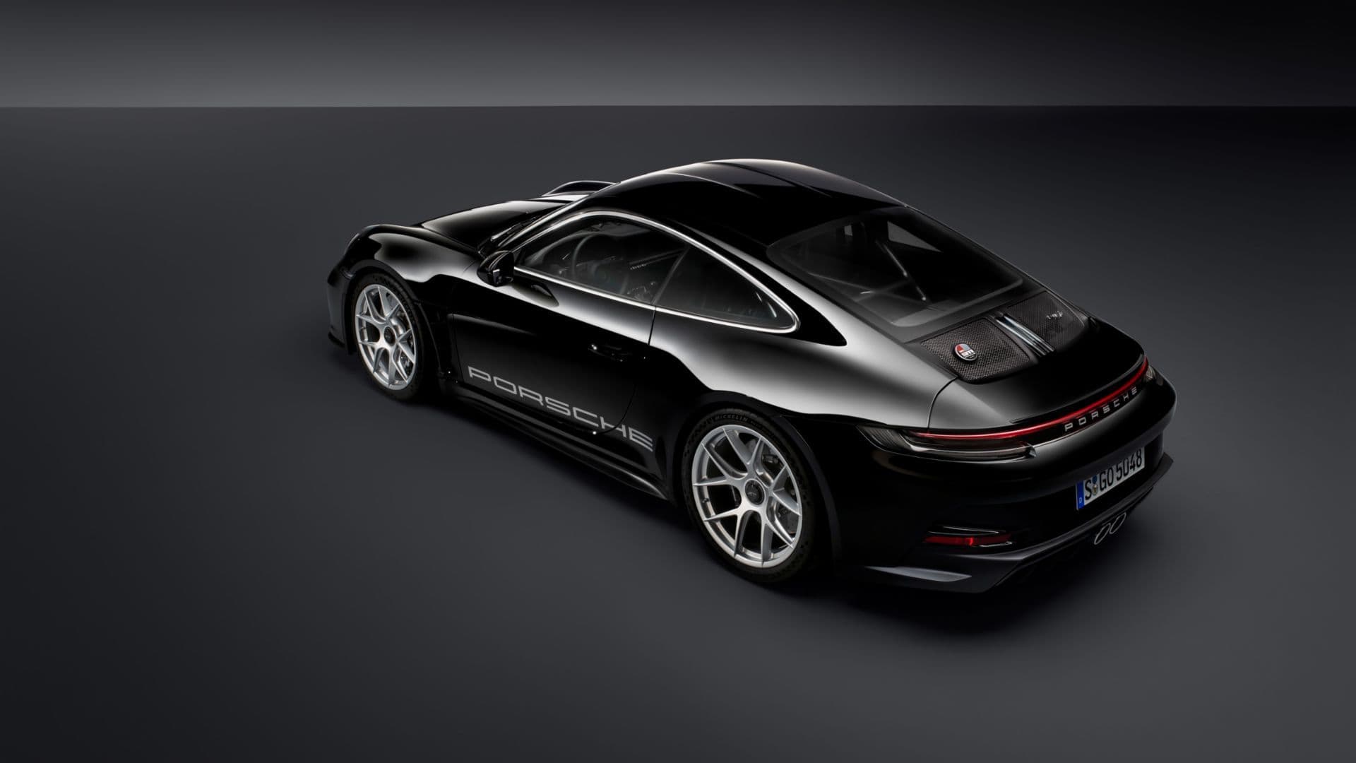 Porsche 911 ST 992 in black, rear angle studio shot highlighting GT3-inspired styling.