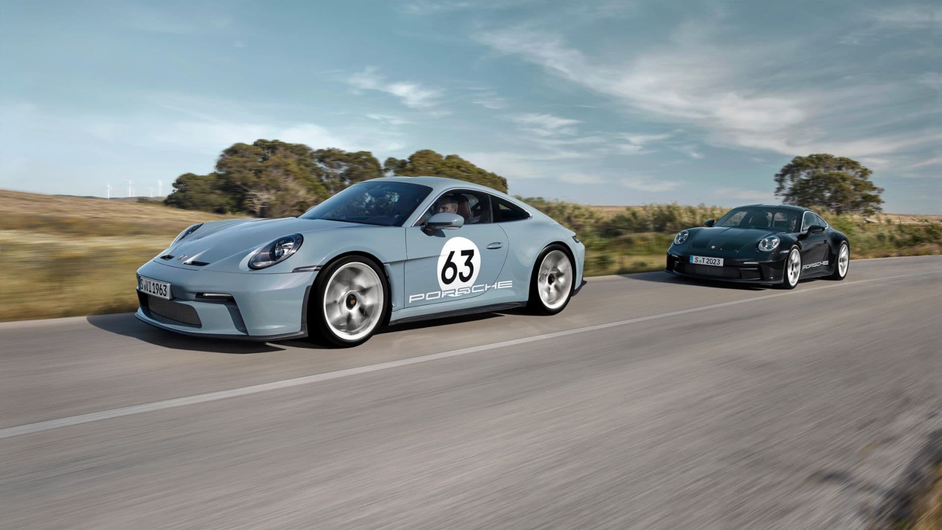 Porsche 911 S/T 992 driving on a scenic road to celebrate the 60th anniversary of the 911