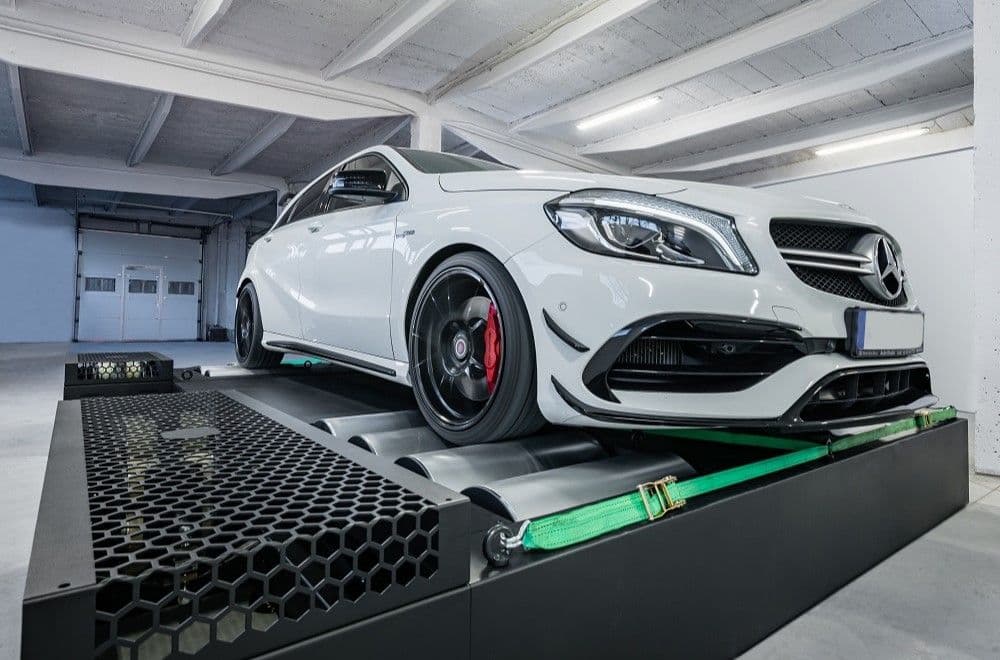 Mercedes-AMG A45 secured on Dyno Revolt dynamometer during performance tuning and power testing session